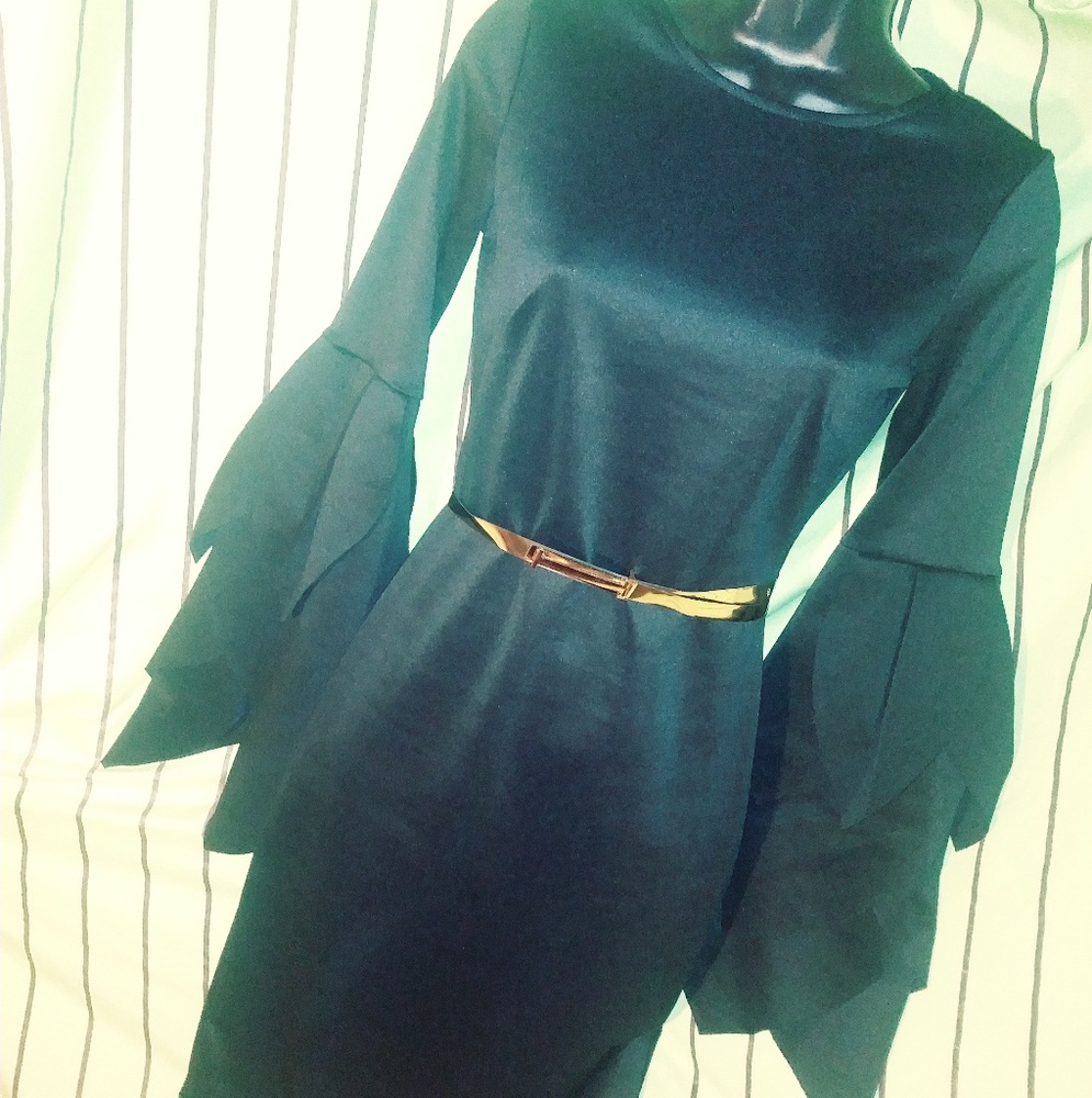 Beautiful Black dress with a gold belt and jewelry